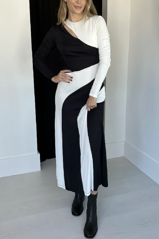 Backless Women Dress for a Sexy and Alluring Look at Evening EventsBlack And White Cut-Out Long Sleeve Midi Dress